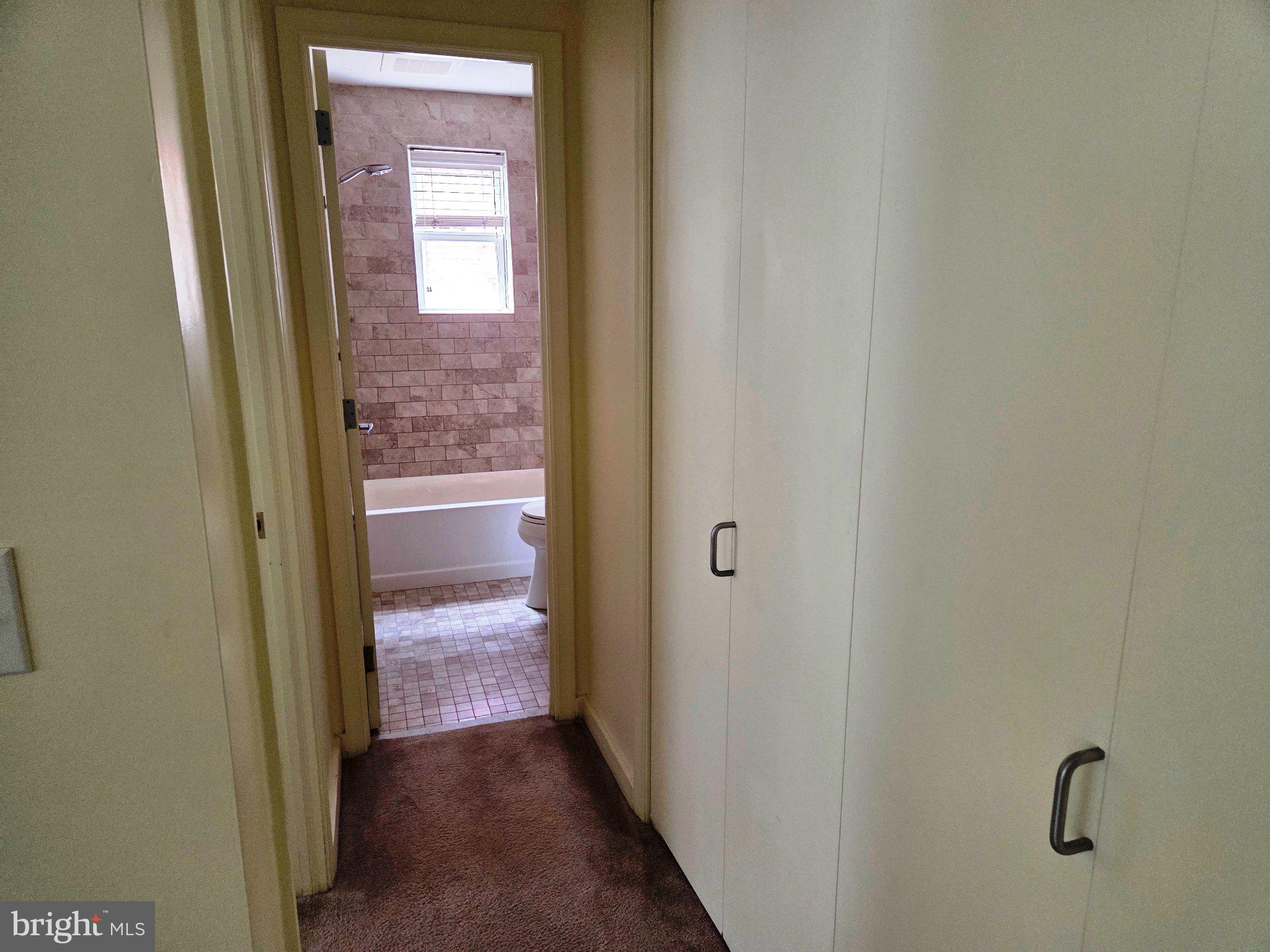1600 Church Road, Unit B108 Wyncote, PA 19095 - Photo 11 of 12 Hall with view of Tiled bath