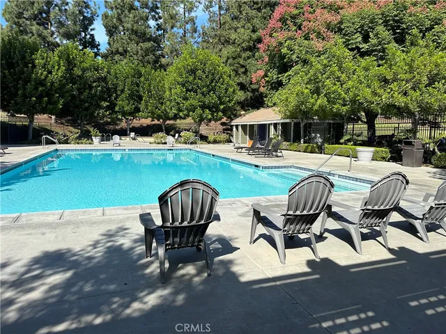 a view of a patio with chair and table