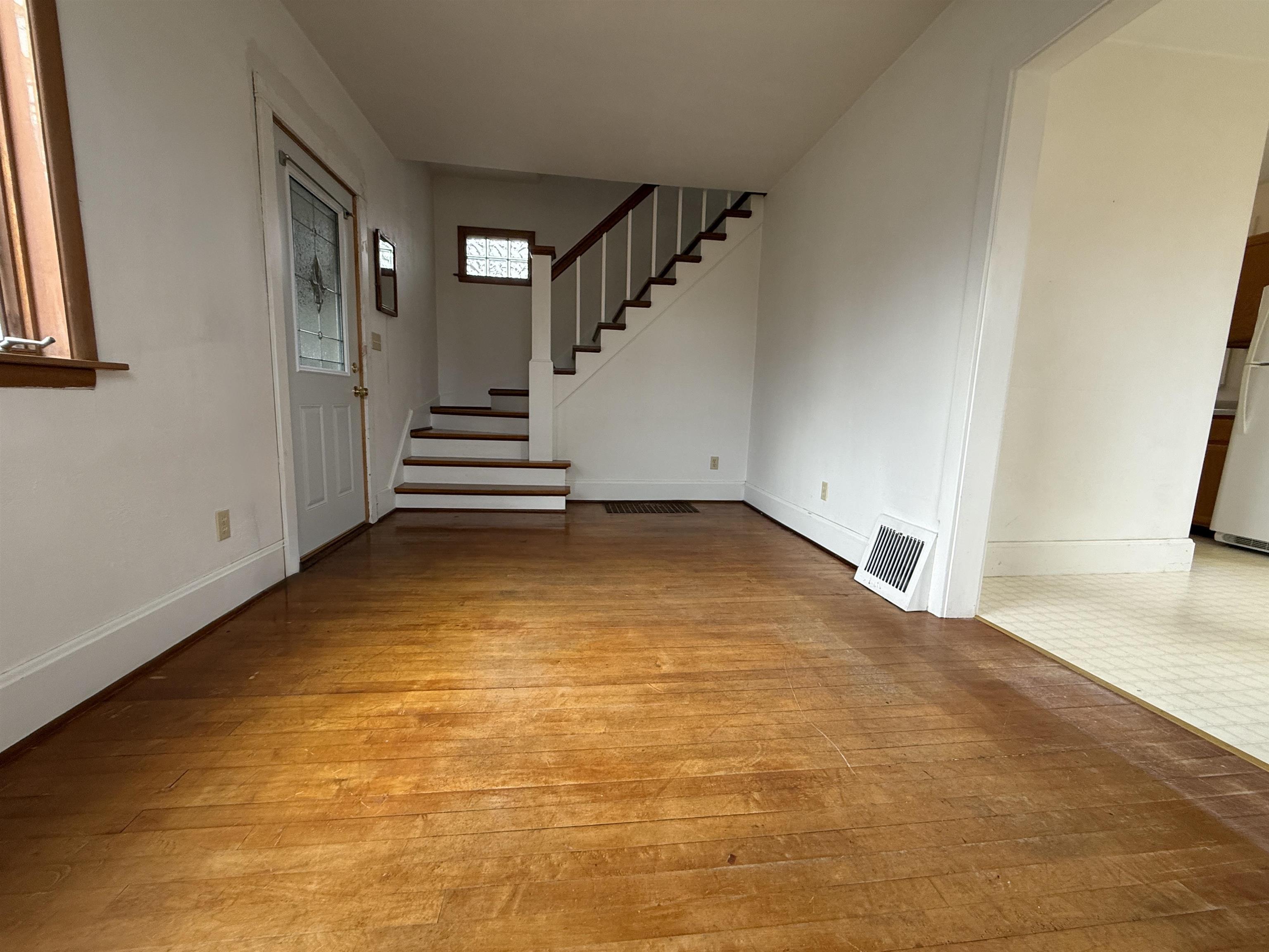 214 8th Street Southwest Chisholm, MN 55719 - Photo 12 of 25 Entryway featuring light wood-type flooring and stairs