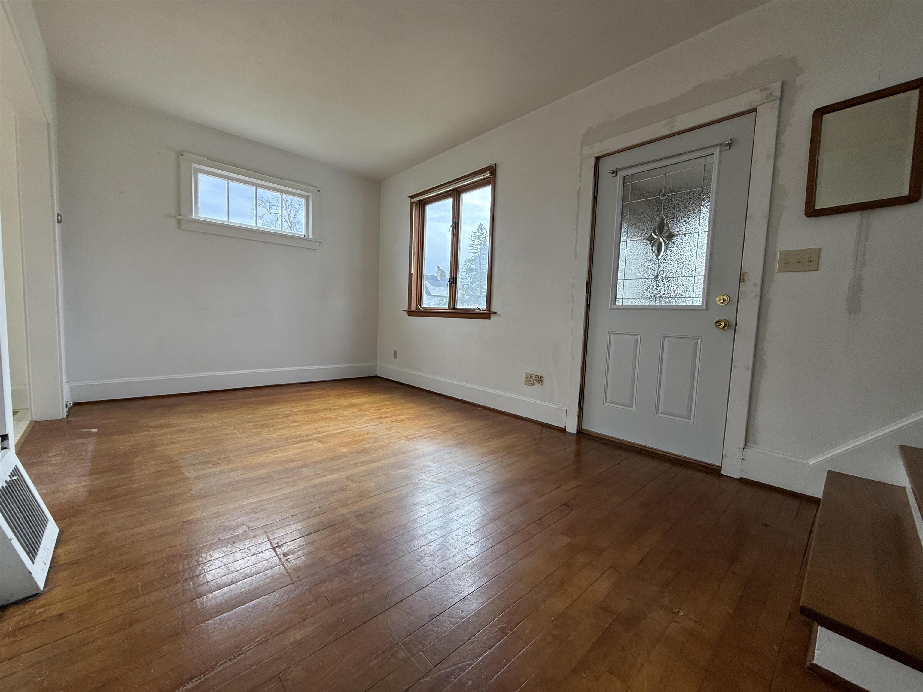 214 8th Street Southwest Chisholm, MN 55719 - Photo 13 of 25 Entryway featuring baseboards and dark wood finished floors