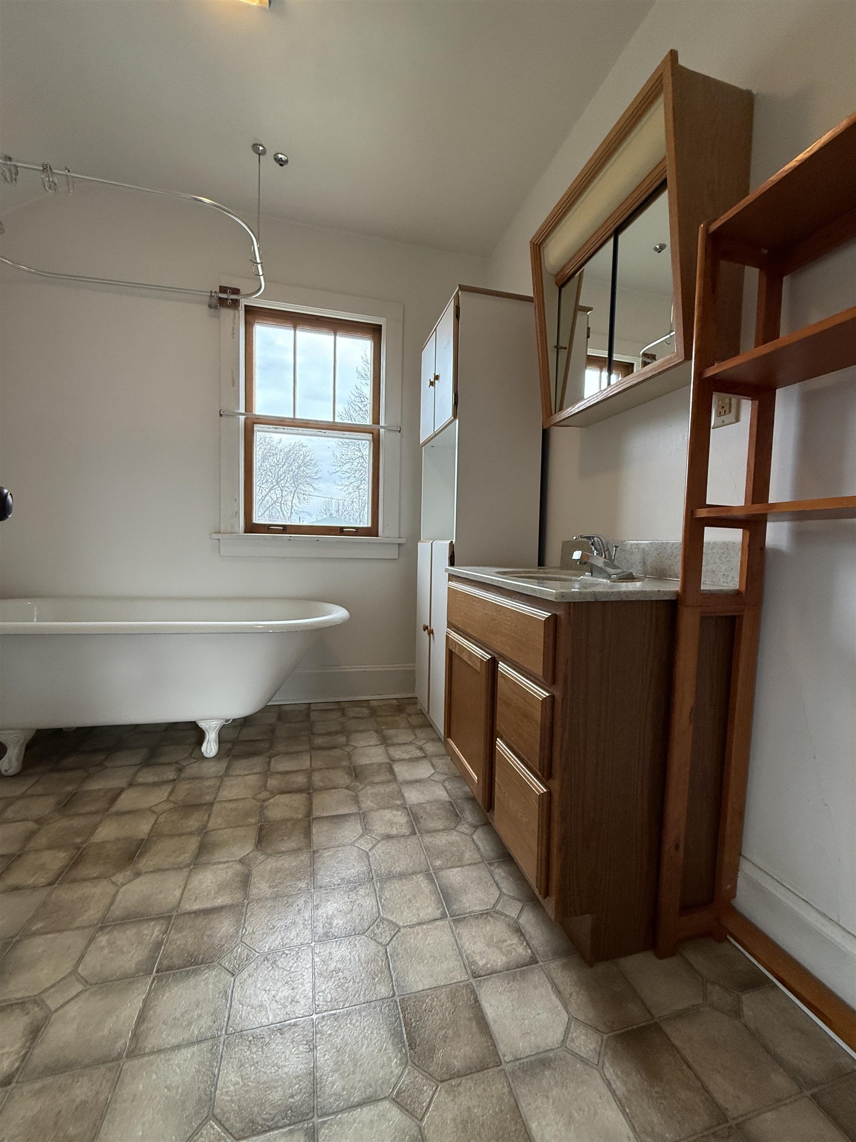 214 8th Street Southwest Chisholm, MN 55719 - Photo 16 of 25 Bathroom featuring a soaking tub and vanity