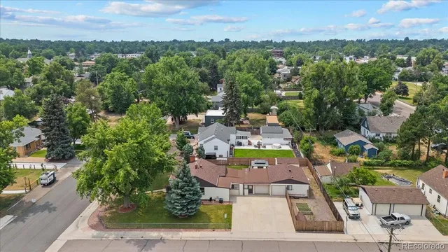 an aerial view of a house with a garden