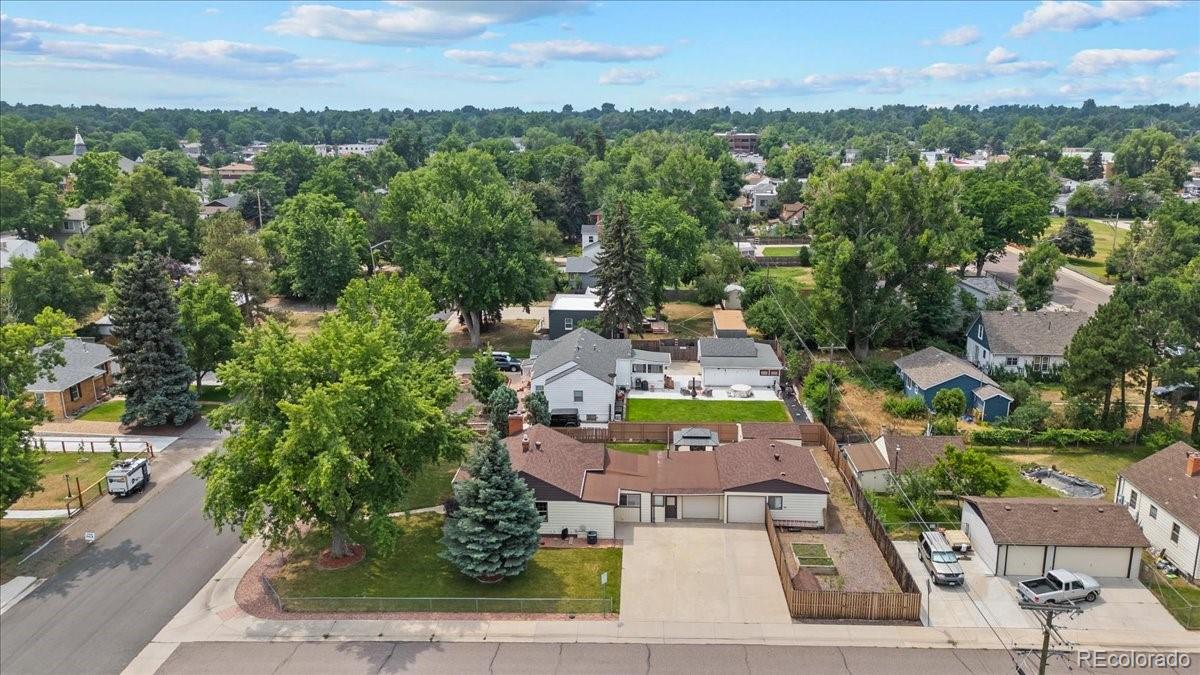 an aerial view of a house with a garden