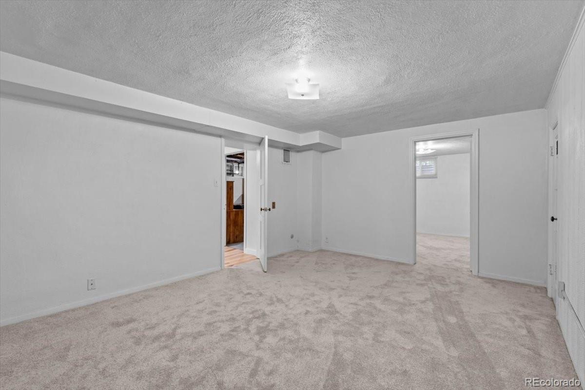 4095 Quay Street Wheat Ridge, CO 80033 - Photo 19 of 32 a view of an empty room