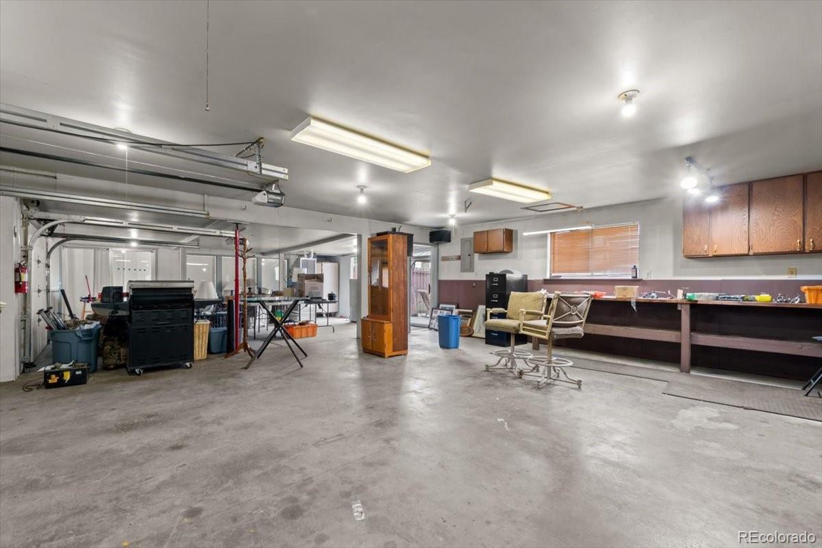 4095 Quay Street Wheat Ridge, CO 80033 - Photo 23 of 32 a view of a garage with chairs