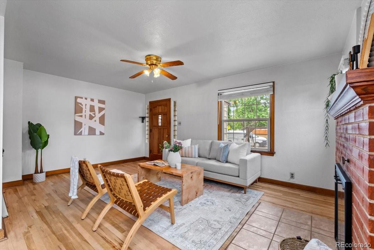4095 Quay Street Wheat Ridge, CO 80033 - Photo 5 of 32 a living room with furniture and a window