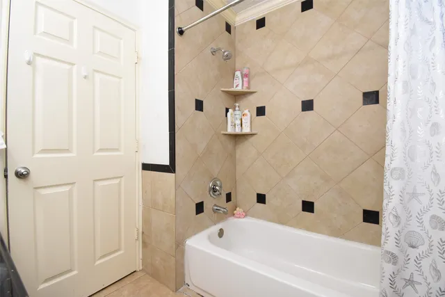 a bed room with a bed and a window