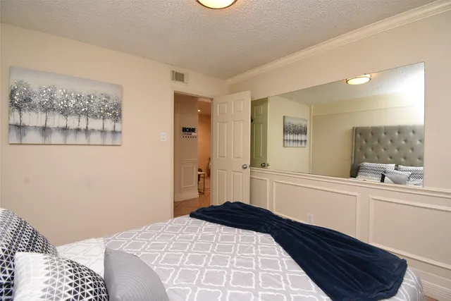 a bathroom with a sink vanity and a mirror