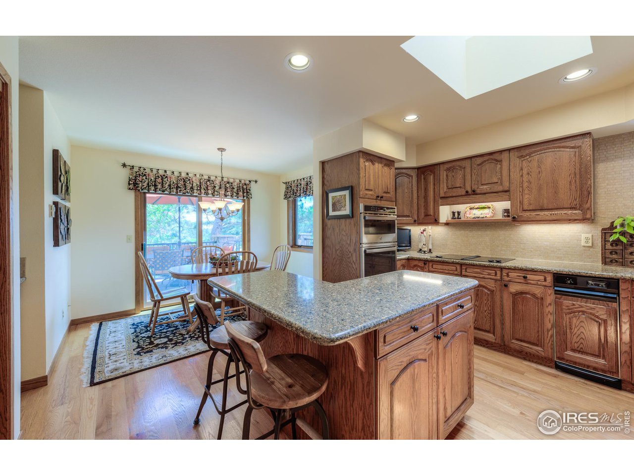 293 Broken Fence Road Boulder, CO 80302 - Photo 12 of 40 Light & Bright Kitchen, Quartz Countertops, Hardwood Flooring