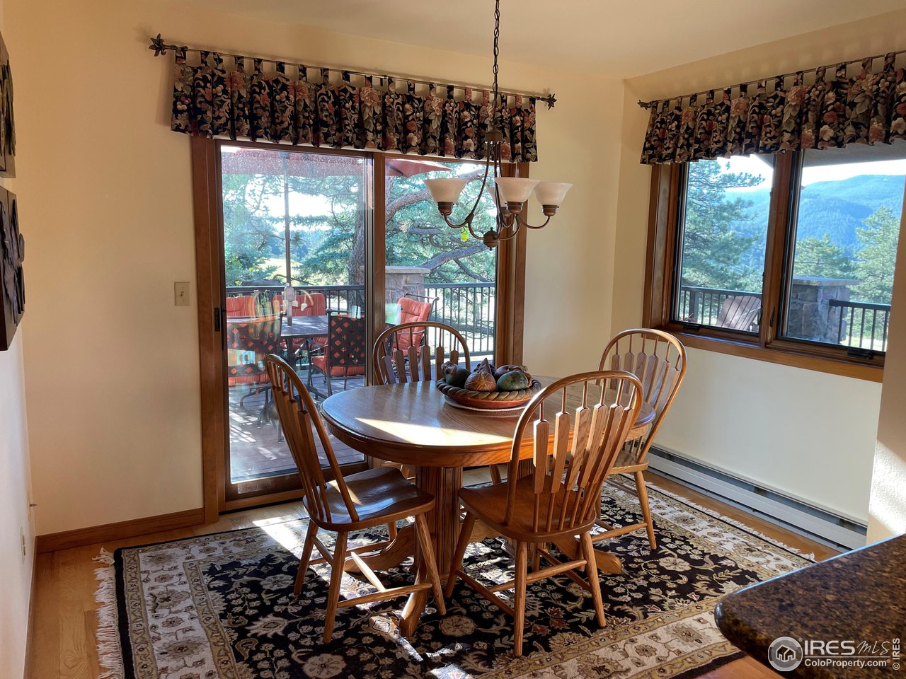 293 Broken Fence Road Boulder, CO 80302 - Photo 13 of 40 Comfortable Casual Dining with Deck Access