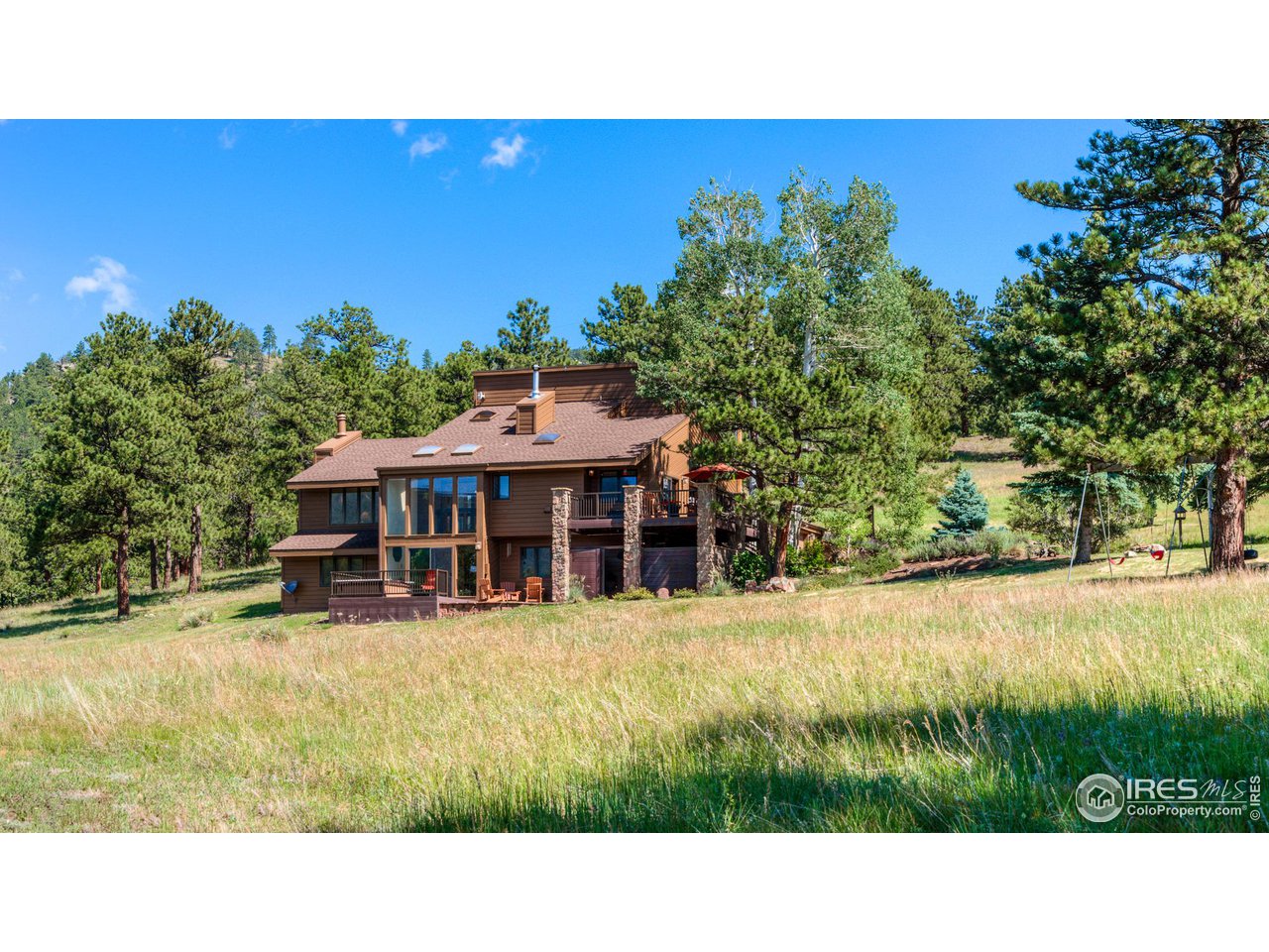 293 Broken Fence Road Boulder, CO 80302 - Photo 7 of 40 Multiple Outdoor Spaces to Relax and Take in the Fabulous View