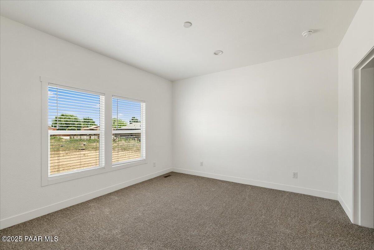 55 Hawaii Road Paulden, AZ 86334 - Photo 5 of 12 an empty room with a window