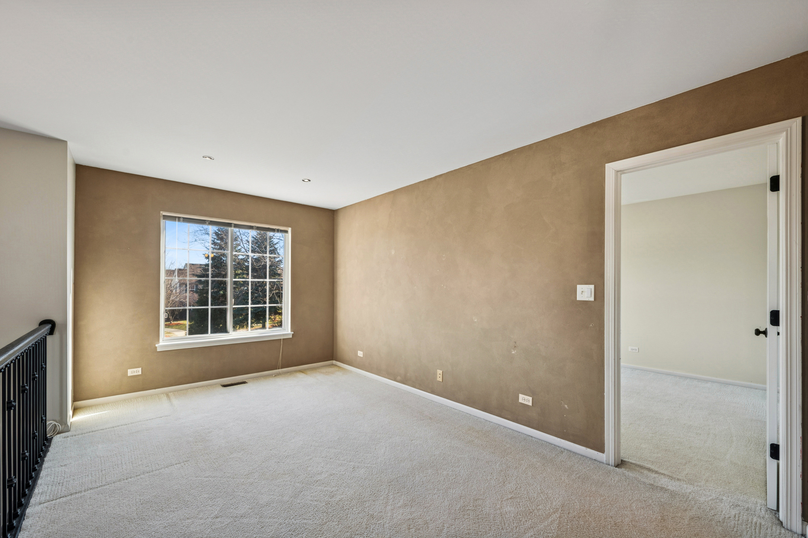 651 Georgian Court Addison, IL 60101 - Photo 16 of 24 a view of an empty room with a window