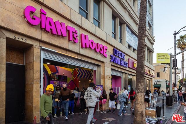 a view of street with shops