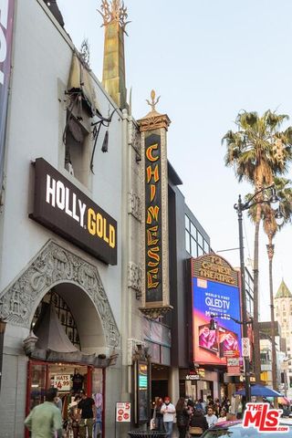a view of street and shops and a retail shops