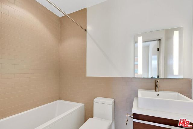 a bathroom with a sink and a bathtub