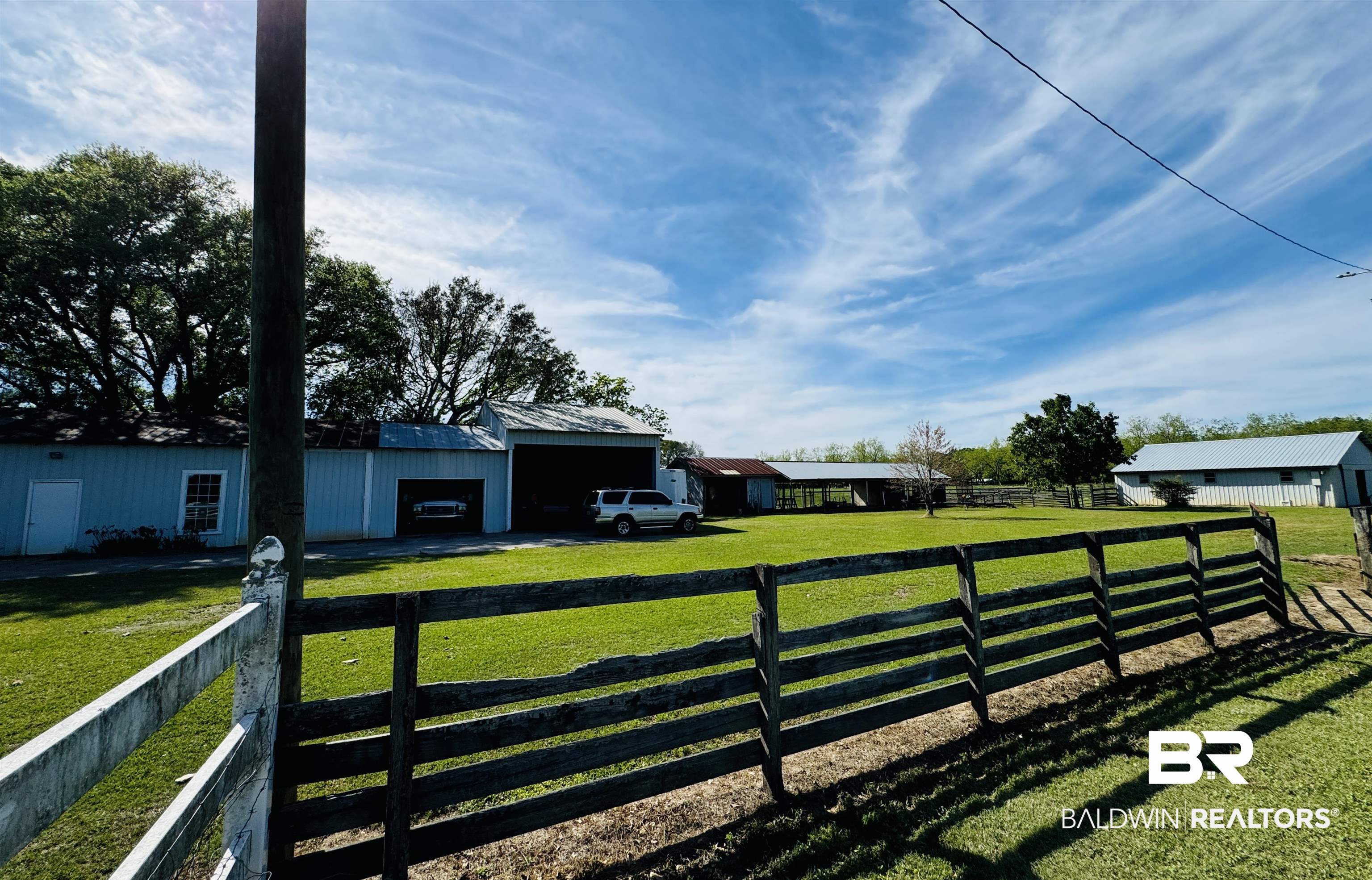 13795 White Road Silverhill, AL 36576 - Photo 70 of 99 View of yard featuring an outbuilding, a garage, a pole building, and a carport