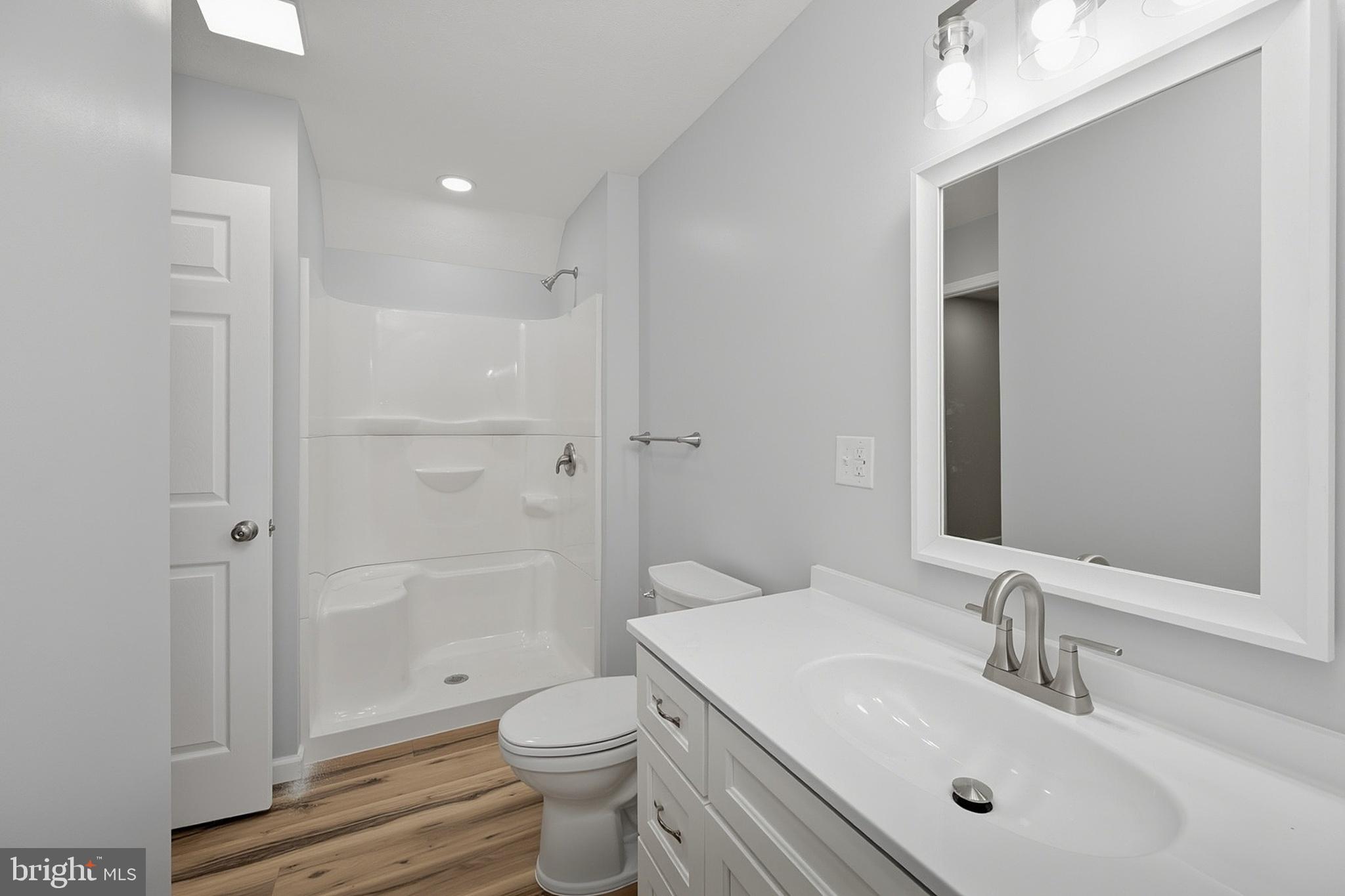 114 Dripping Spring Road Morgantown, WV 26508 - Photo 89 of 102 a bathroom with a sink a toilet and shower