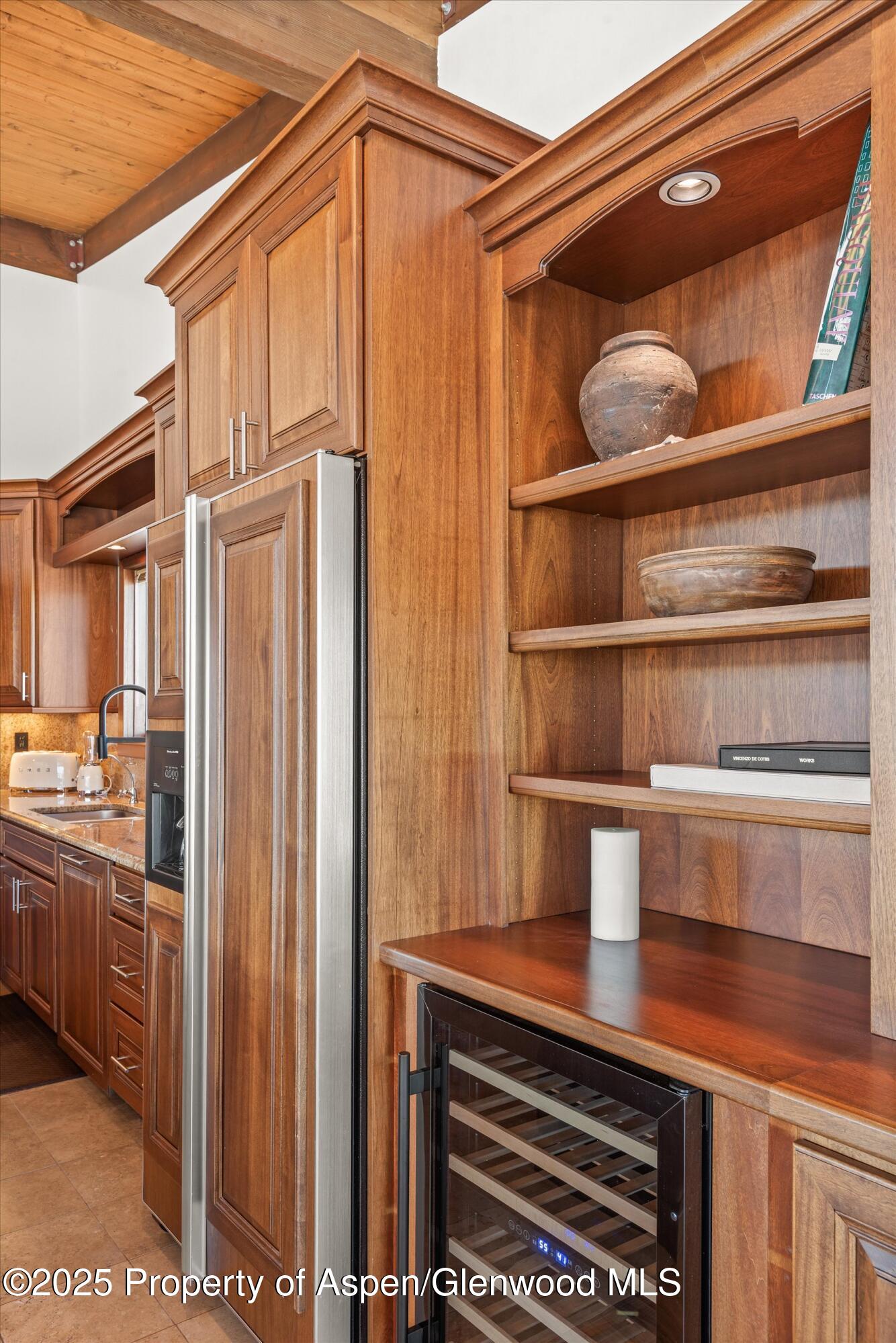 2227 Juniper Hill Road Aspen, CO 81611 - Photo 14 of 40 a kitchen with a sink and cabinets