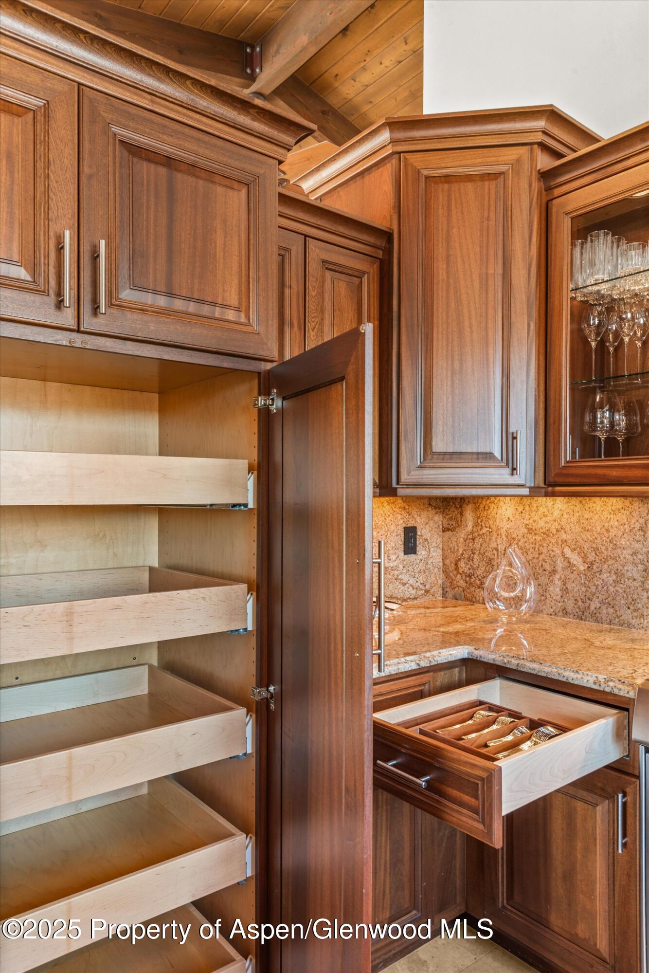 2227 Juniper Hill Road Aspen, CO 81611 - Photo 16 of 40 a kitchen with a stove and a microwave