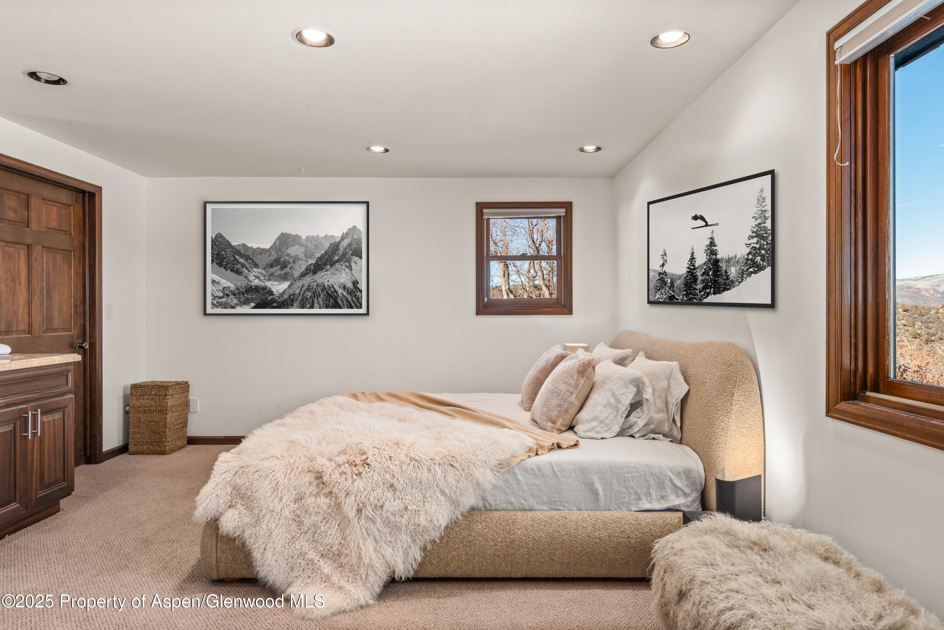 2227 Juniper Hill Road Aspen, CO 81611 - Photo 21 of 40 a bedroom with bed and furniture