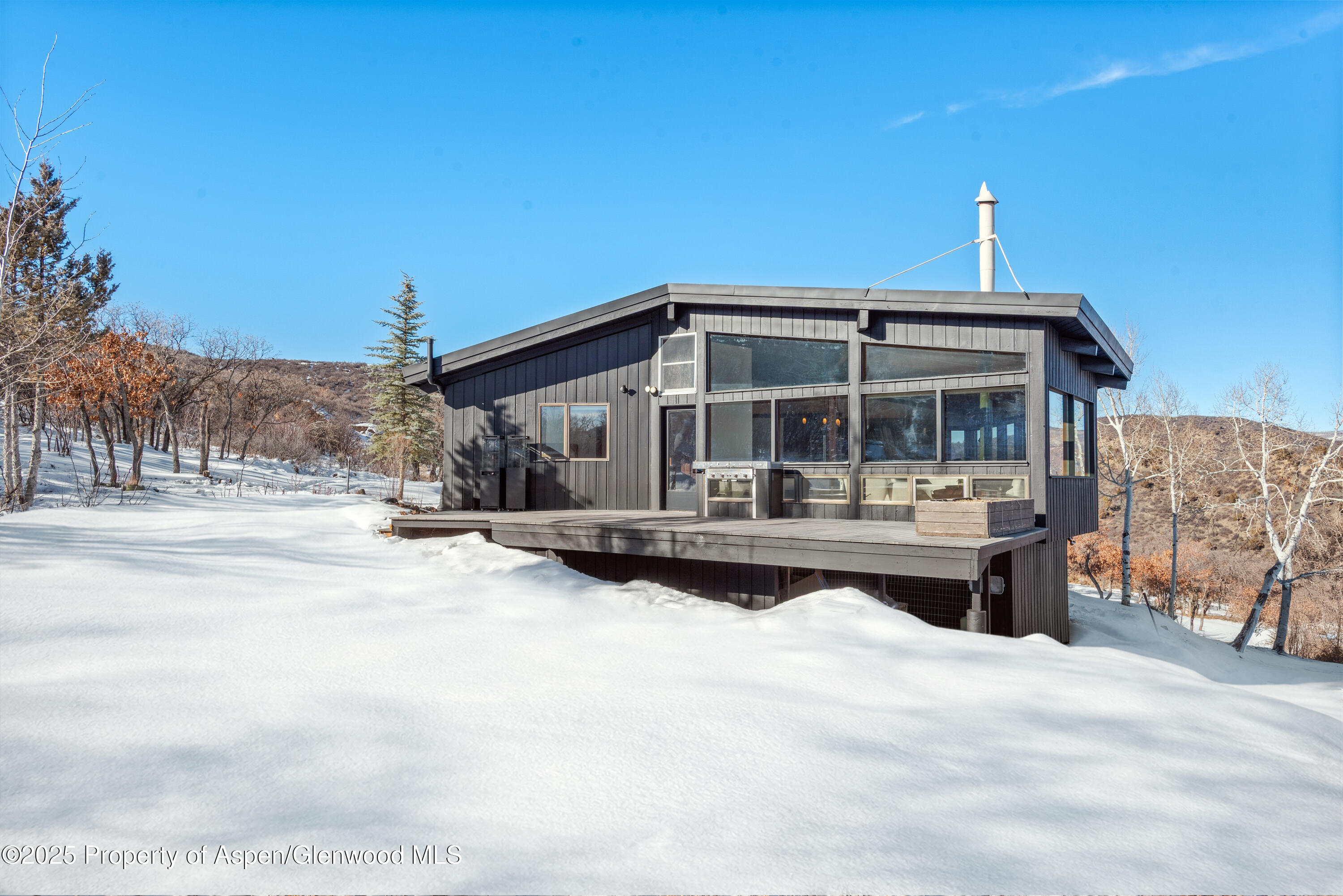 2227 Juniper Hill Road Aspen, CO 81611 - Photo 35 of 40 a view of house with yard and entertaining space