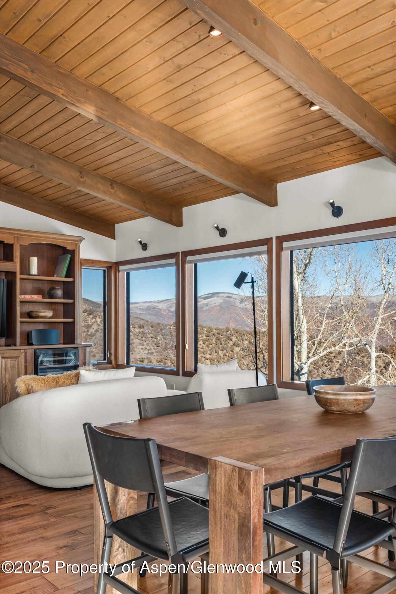 2227 Juniper Hill Road Aspen, CO 81611 - Photo 9 of 40 a view of a dining room with furniture window and outside view