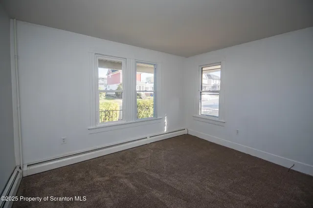 a kitchen with a stove and a microwave