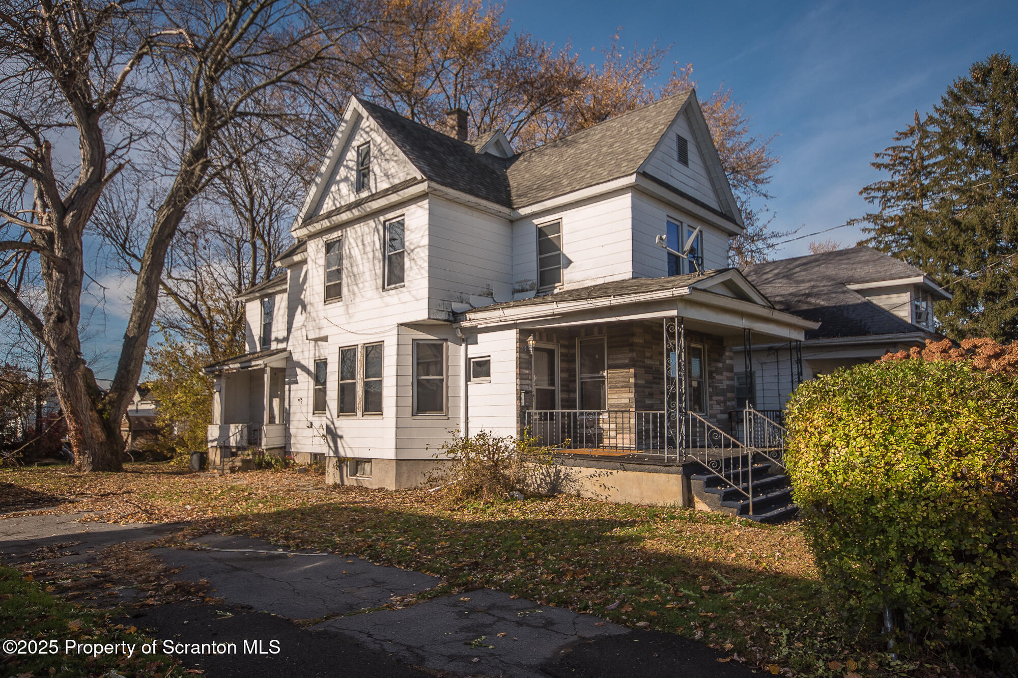 1227 Rundle Street Scranton, PA 18504 - Photo 3 of 43 a front view of a house with a yard