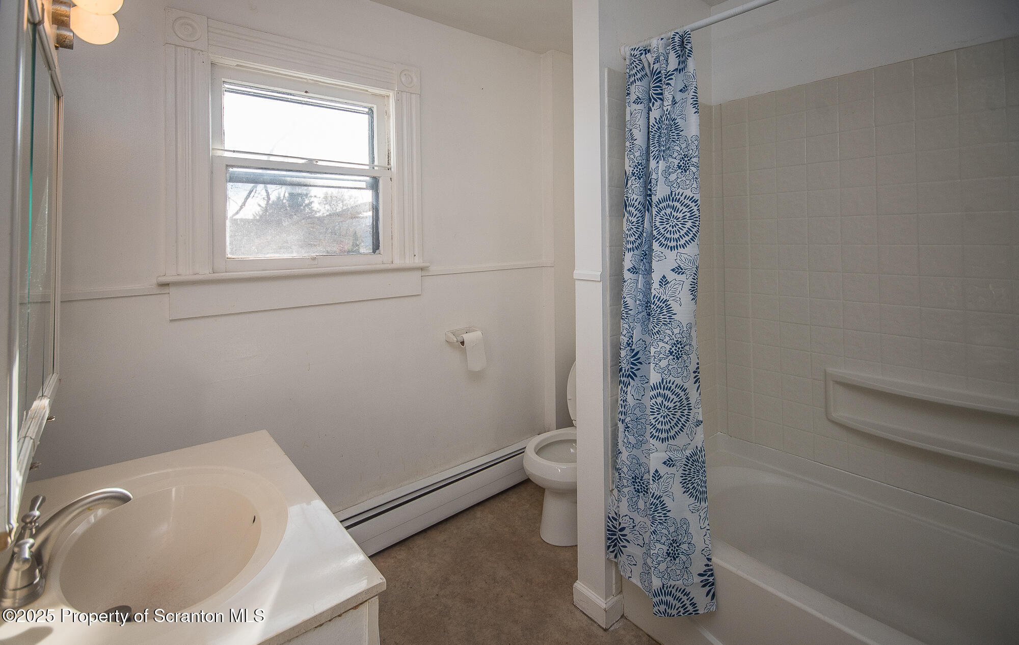 1227 Rundle Street Scranton, PA 18504 - Photo 37 of 43 a bathroom with a bathtub a shower and a sink
