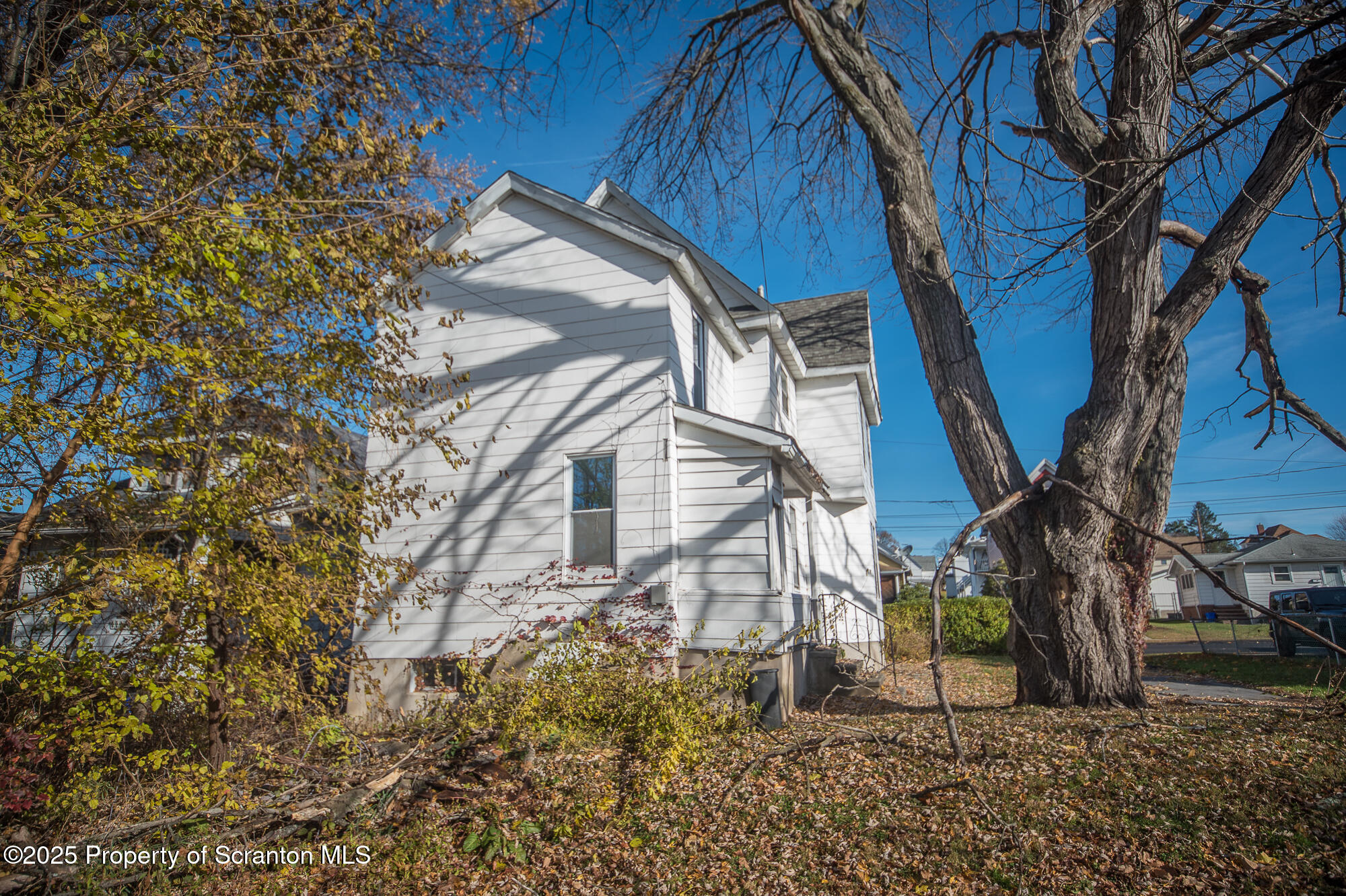 1227 Rundle Street Scranton, PA 18504 - Photo 8 of 43 a view of a house with a yard