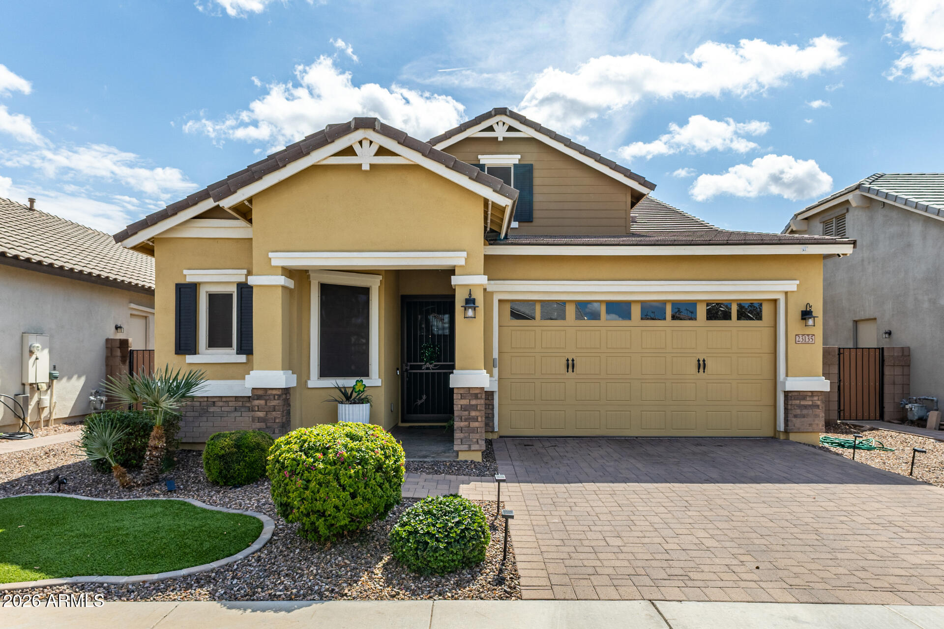 23135 East Thornton Road Queen Creek, AZ 85142 - Photo 2 of 61 a front view of a house with garden