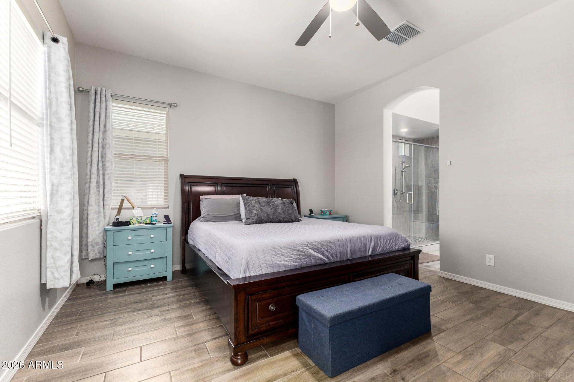 23135 East Thornton Road Queen Creek, AZ 85142 - Photo 21 of 61 a bedroom with a bed and a window