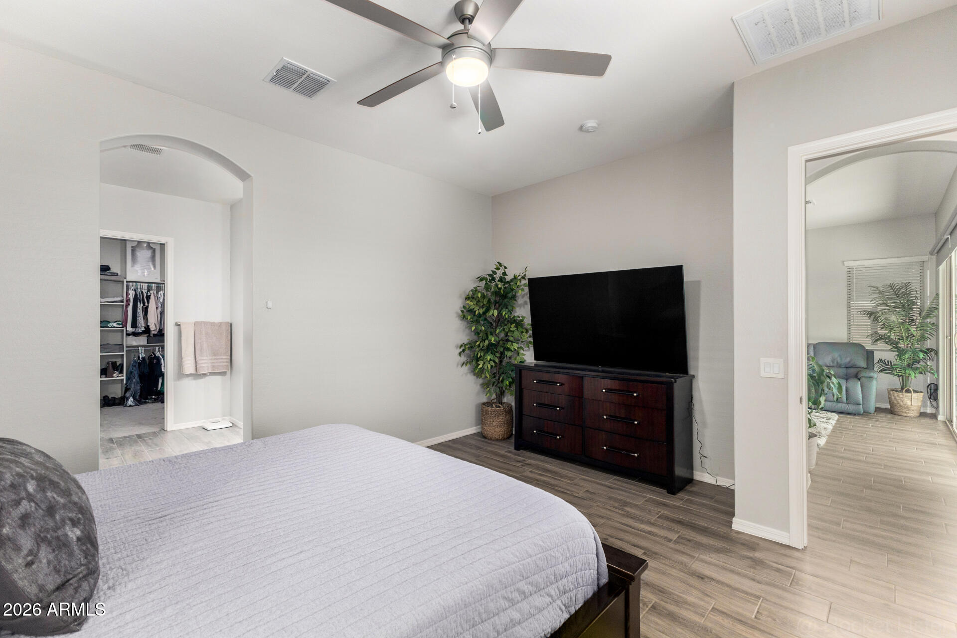 23135 East Thornton Road Queen Creek, AZ 85142 - Photo 22 of 61 a bedroom with a bed and a flat screen tv