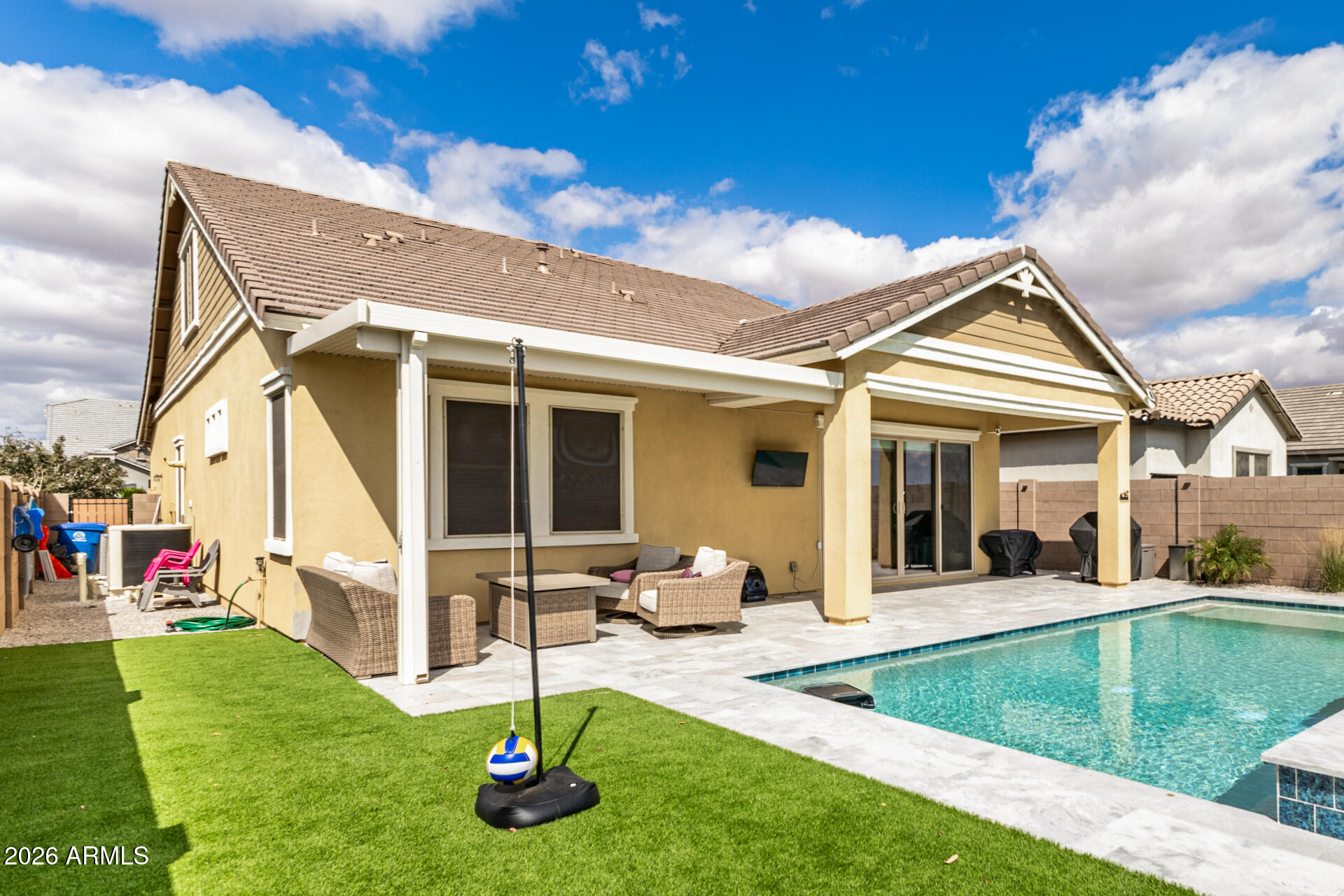 23135 East Thornton Road Queen Creek, AZ 85142 - Photo 43 of 61 a view of a house with a swimming pool and porch with furniture