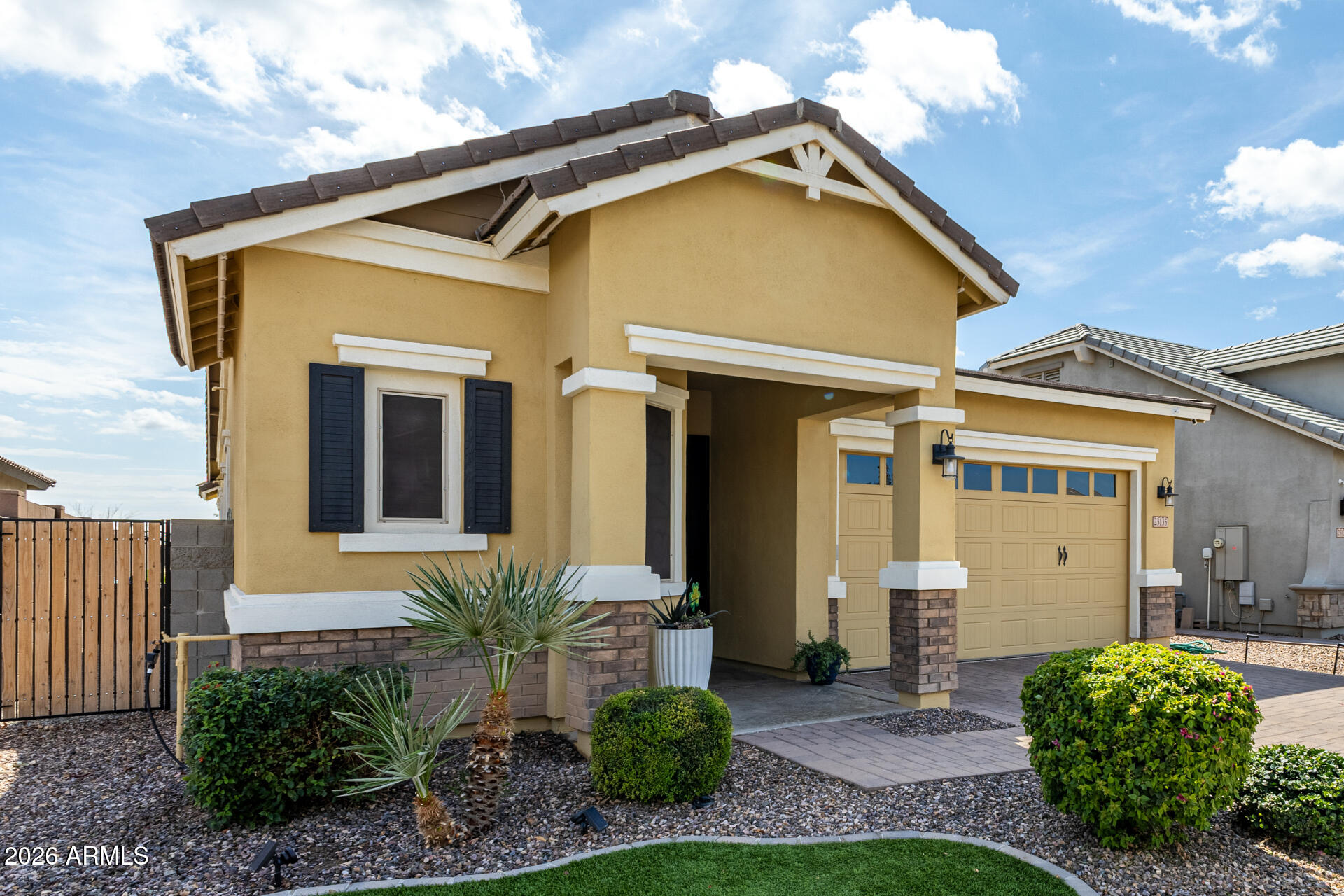 23135 East Thornton Road Queen Creek, AZ 85142 - Photo 5 of 61 a front view of a house with garden