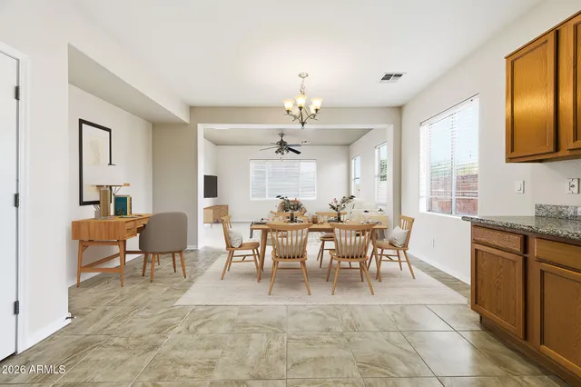 a view of a dining room with furniture