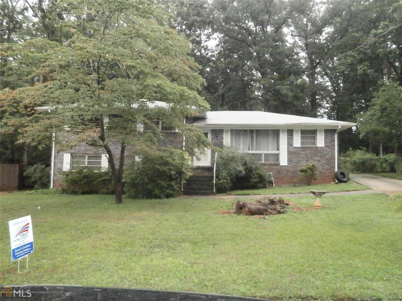 2238 Colleen Court Decatur, GA 30032 - Photo 1 of 1 a front view of a house with a yard