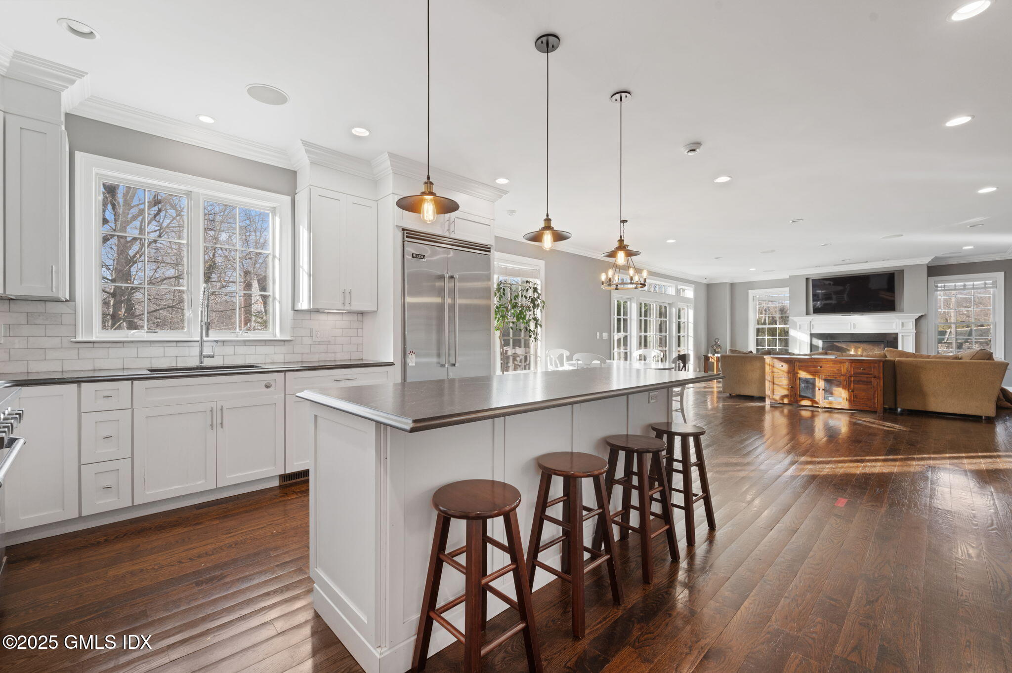 12 Cognewaugh Road Cos Cob, CT 06807 - Photo 19 of 48 a kitchen with wooden floors and wooden cabinets