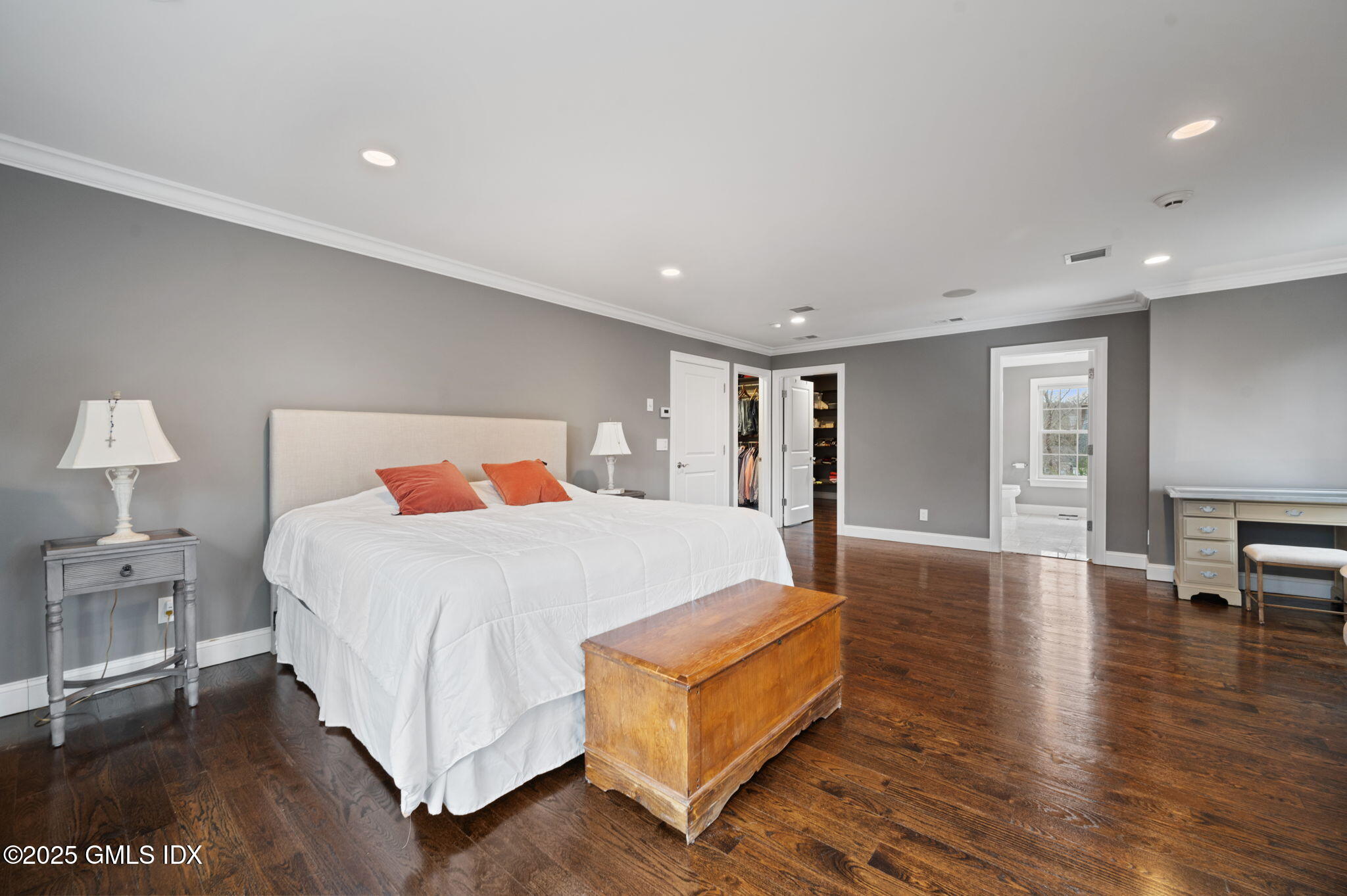 12 Cognewaugh Road Cos Cob, CT 06807 - Photo 23 of 48 a spacious bedroom with a bed and a table in it