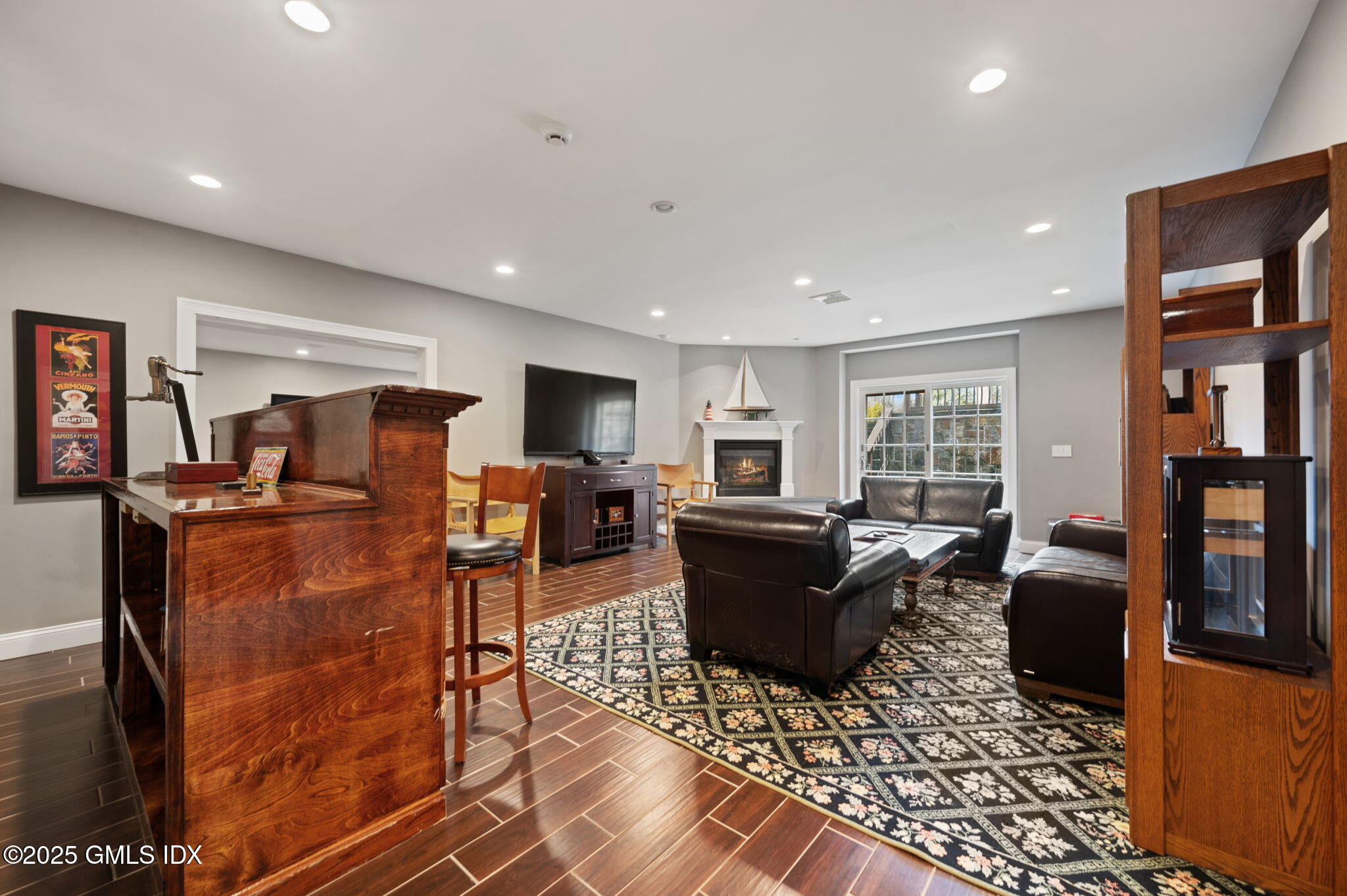 12 Cognewaugh Road Cos Cob, CT 06807 - Photo 37 of 48 a living room with furniture a window and bookshelf