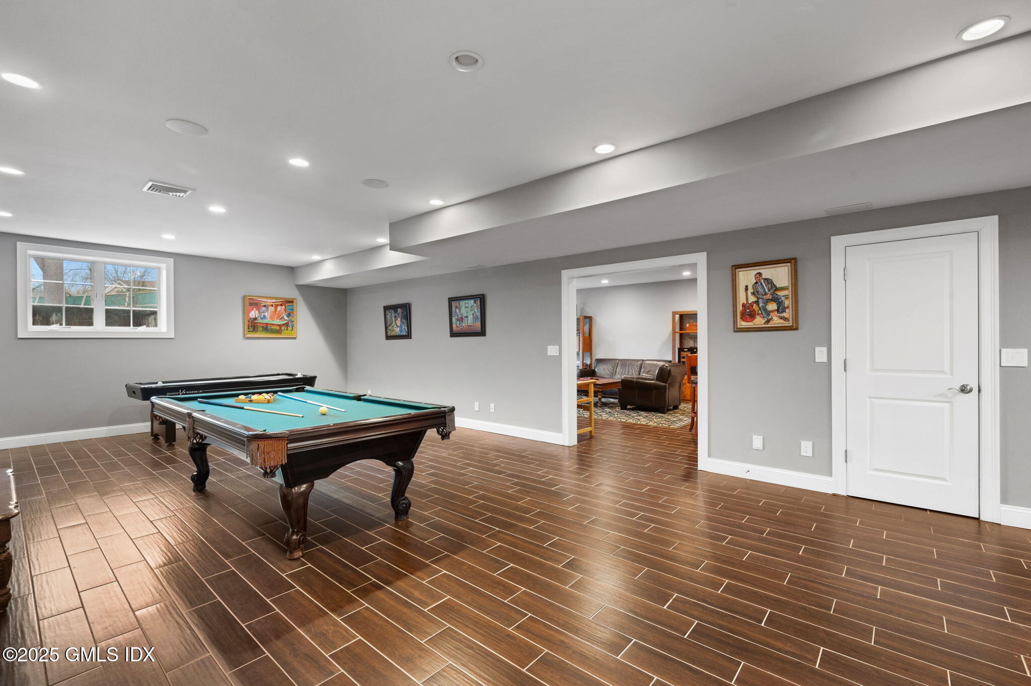 12 Cognewaugh Road Cos Cob, CT 06807 - Photo 43 of 48 a room with furniture and wooden floor