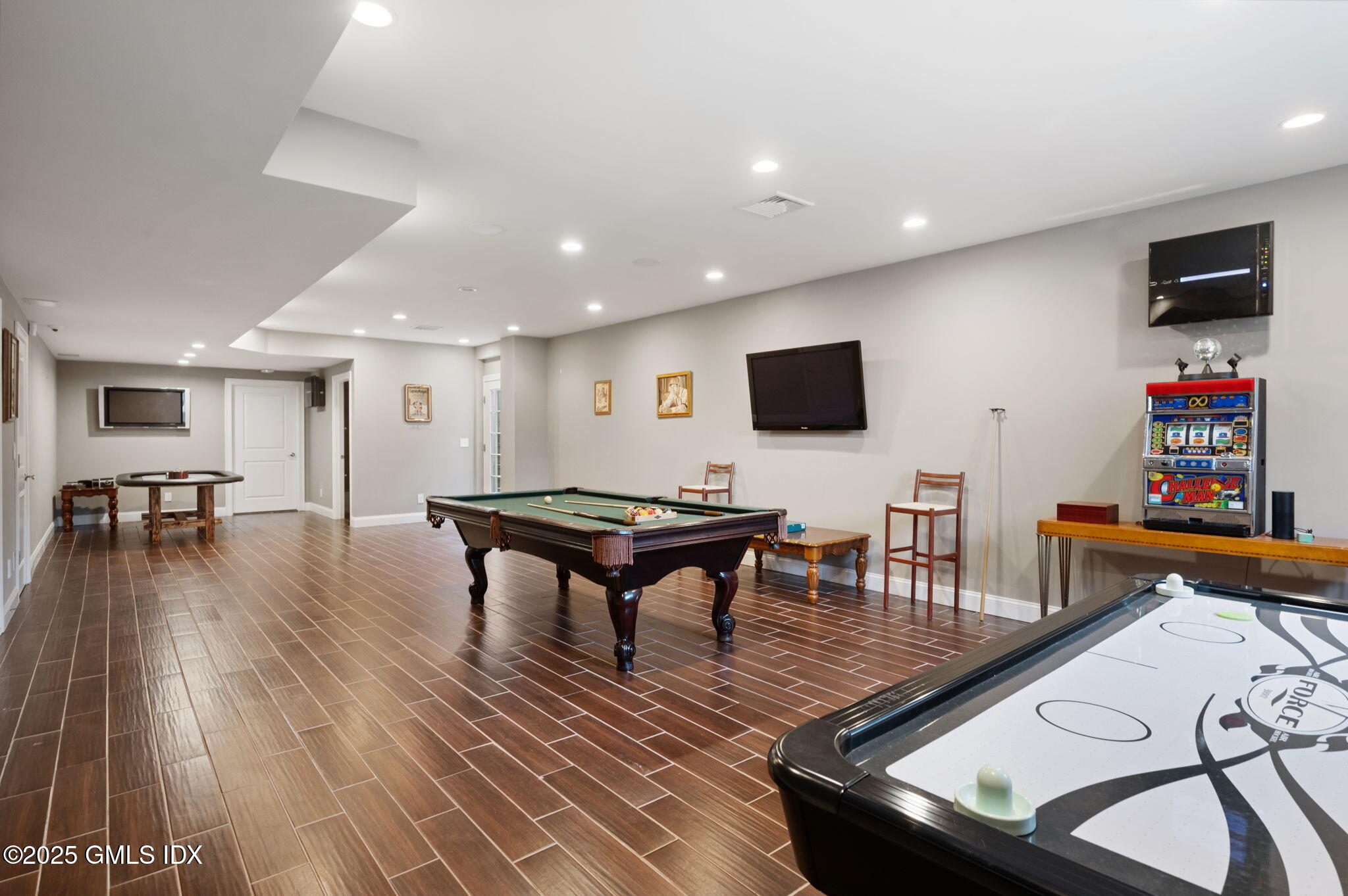 12 Cognewaugh Road Cos Cob, CT 06807 - Photo 44 of 48 a living room with furniture and a flat screen tv