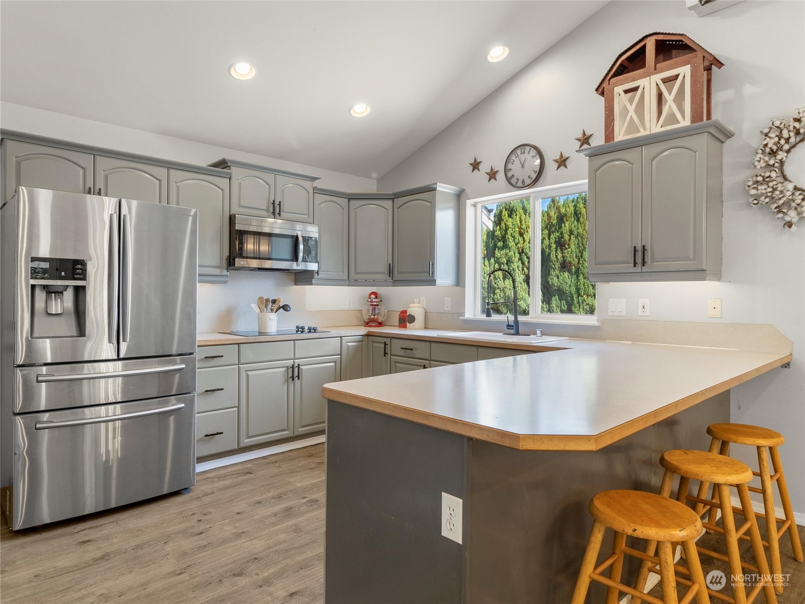 8643 194th Avenue Southwest Rochester, WA 98579 - Photo 15 of 28 a kitchen with stainless steel appliances granite countertop a refrigerator a stove and a sink