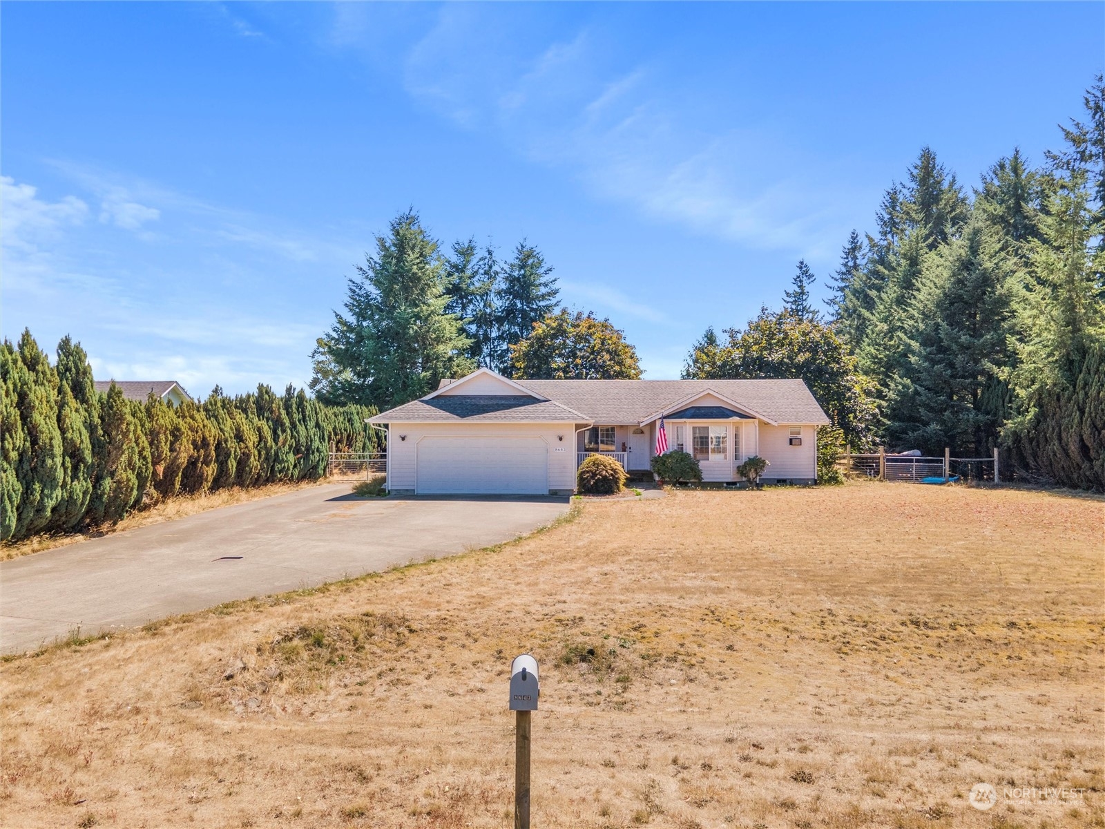8643 194th Avenue Southwest Rochester, WA 98579 - Photo 2 of 28 a front view of a house with a yard