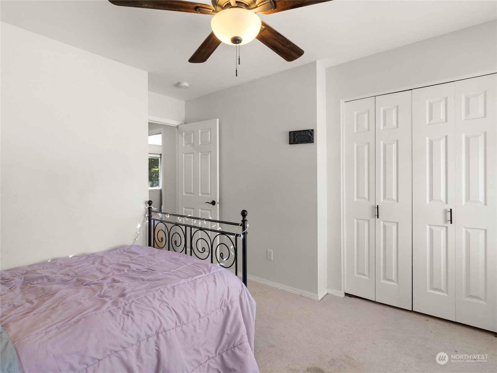 8643 194th Avenue Southwest Rochester, WA 98579 - Photo 21 of 28 a bedroom with a bed and ceiling fan