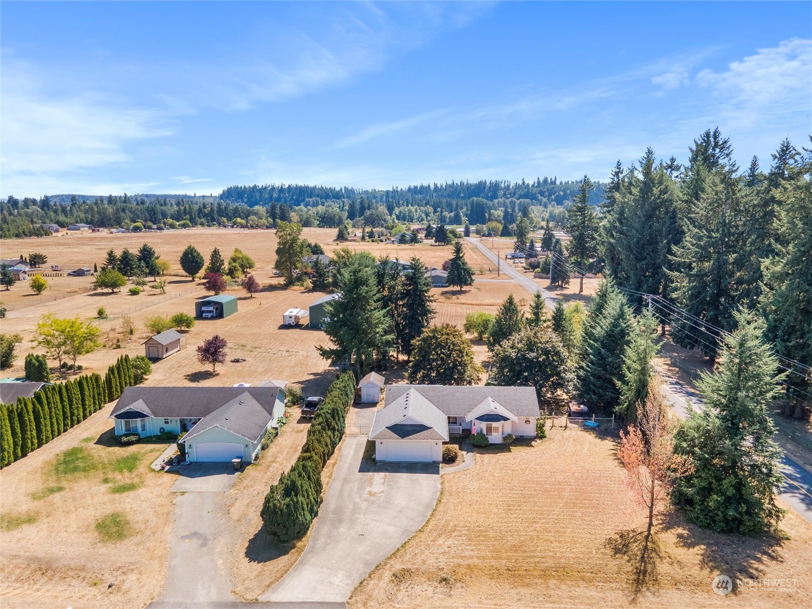 8643 194th Avenue Southwest Rochester, WA 98579 - Photo 3 of 28 a view of a terrace with outdoor seating and city view