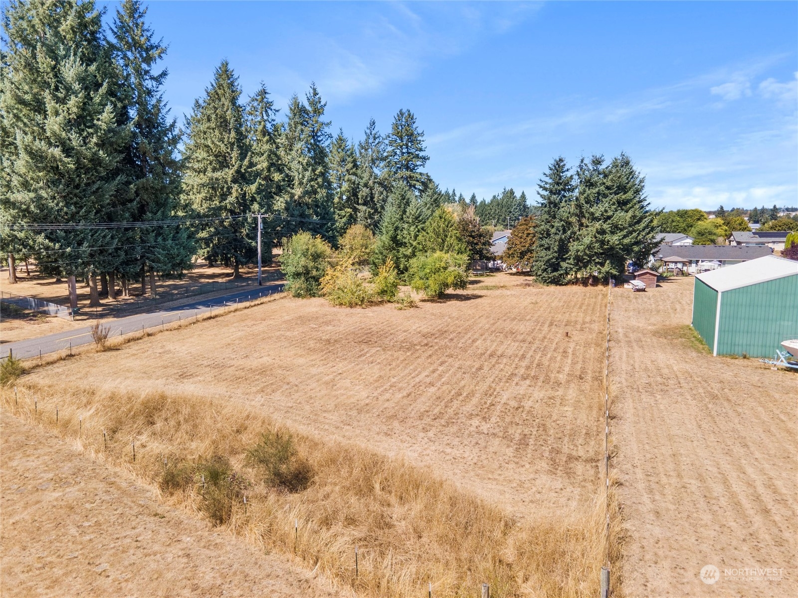 8643 194th Avenue Southwest Rochester, WA 98579 - Photo 8 of 28 a view of backyard of a house