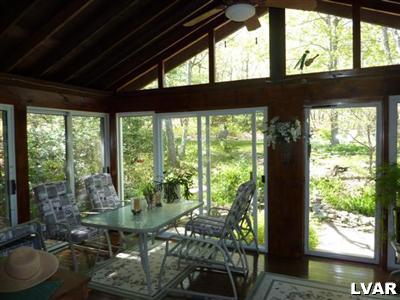 6379 Five Springs Road Shavertown, PA 18708 - Photo 16 of 35 a room with furniture and large windows