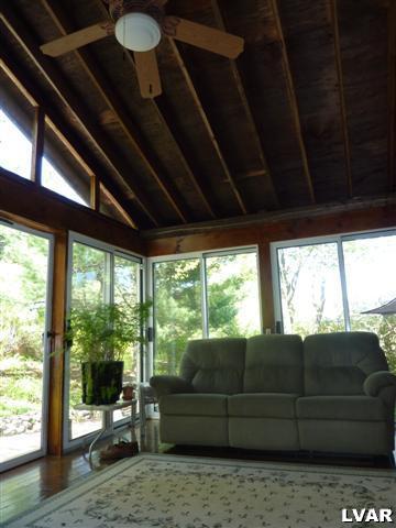6379 Five Springs Road Shavertown, PA 18708 - Photo 18 of 35 a living room with furniture and a large window
